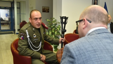 Premier Sobotka with Corporal Brychta at the Prague-Kbely Airport prior to departure, 28 September 2015. 